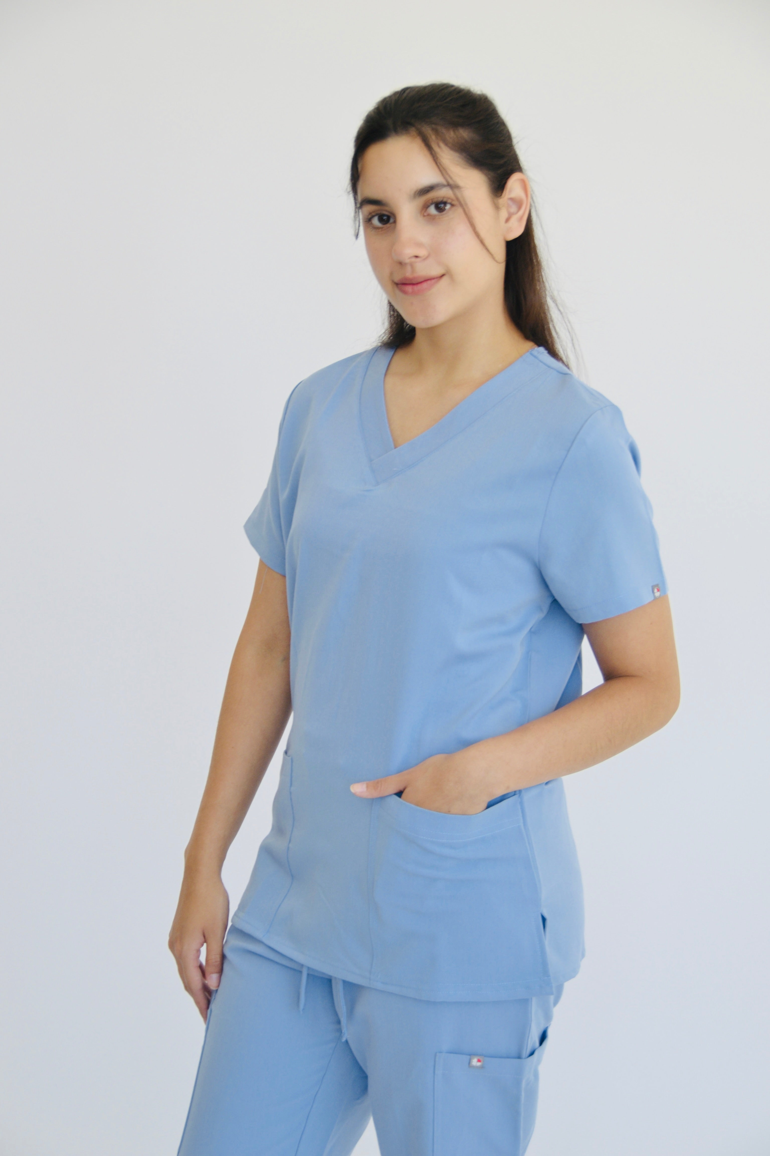 TENA V-NECK TOP WITH 2 HAND POCKETS