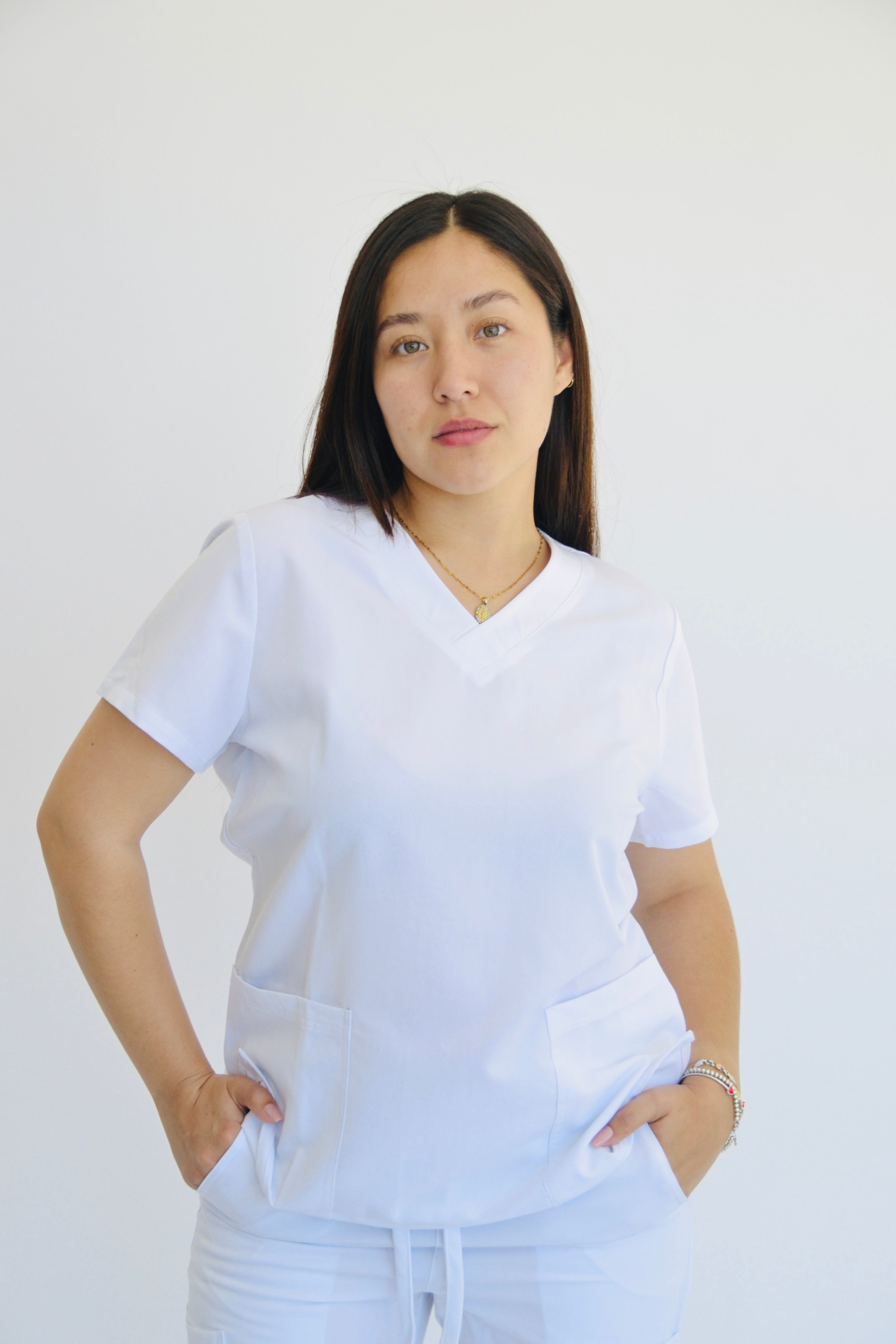 TENA V-NECK TOP WITH 2 HAND POCKETS