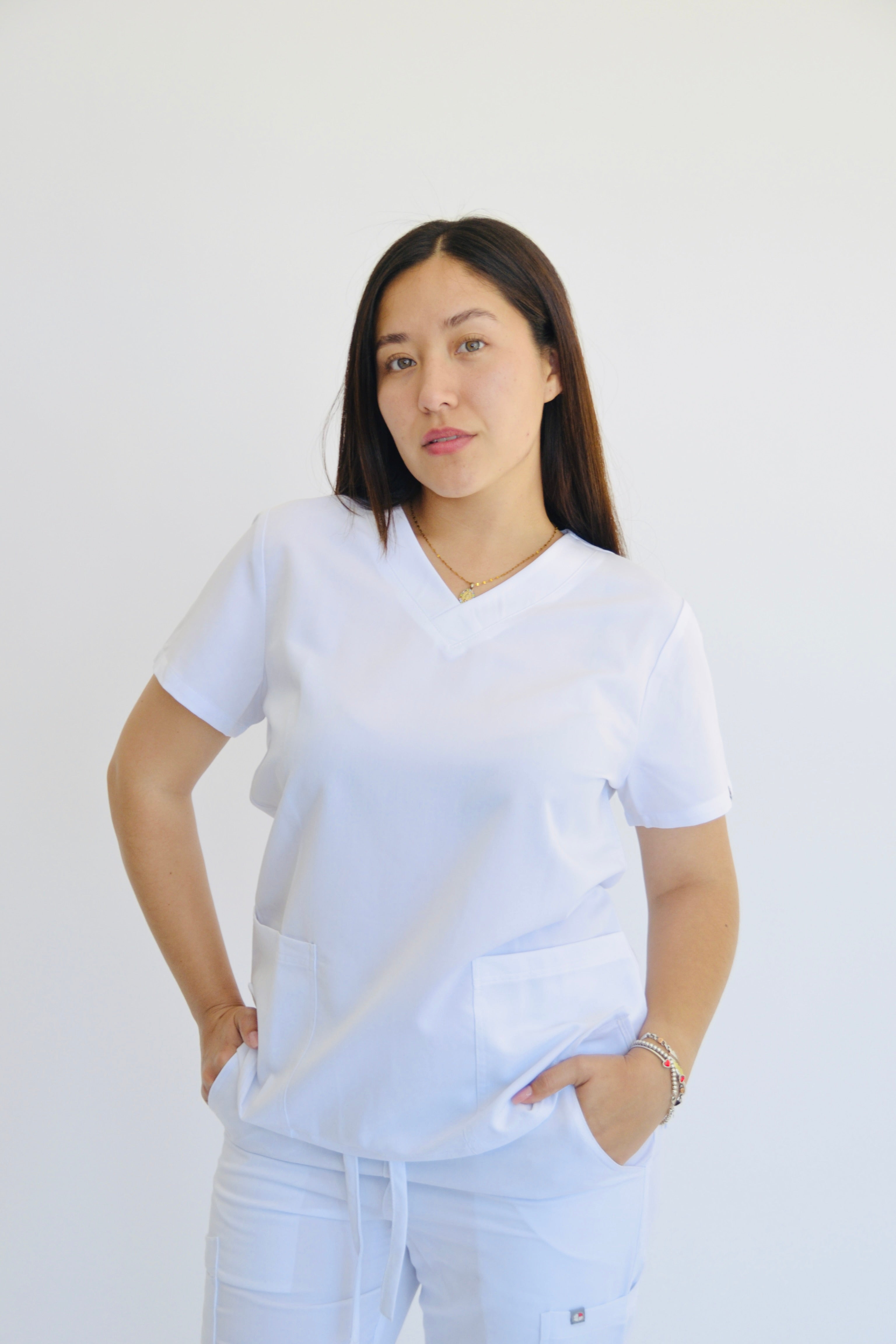 TENA V-NECK TOP WITH 2 HAND POCKETS