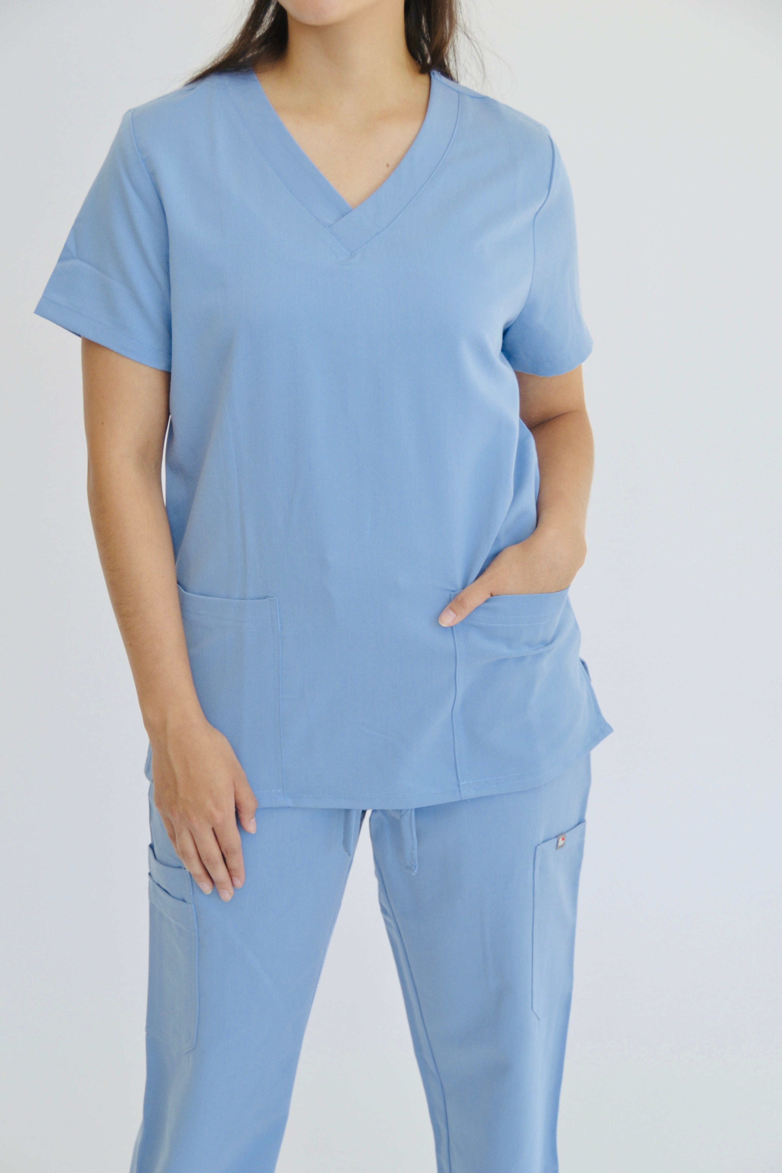 TENA V-NECK TOP WITH 2 HAND POCKETS