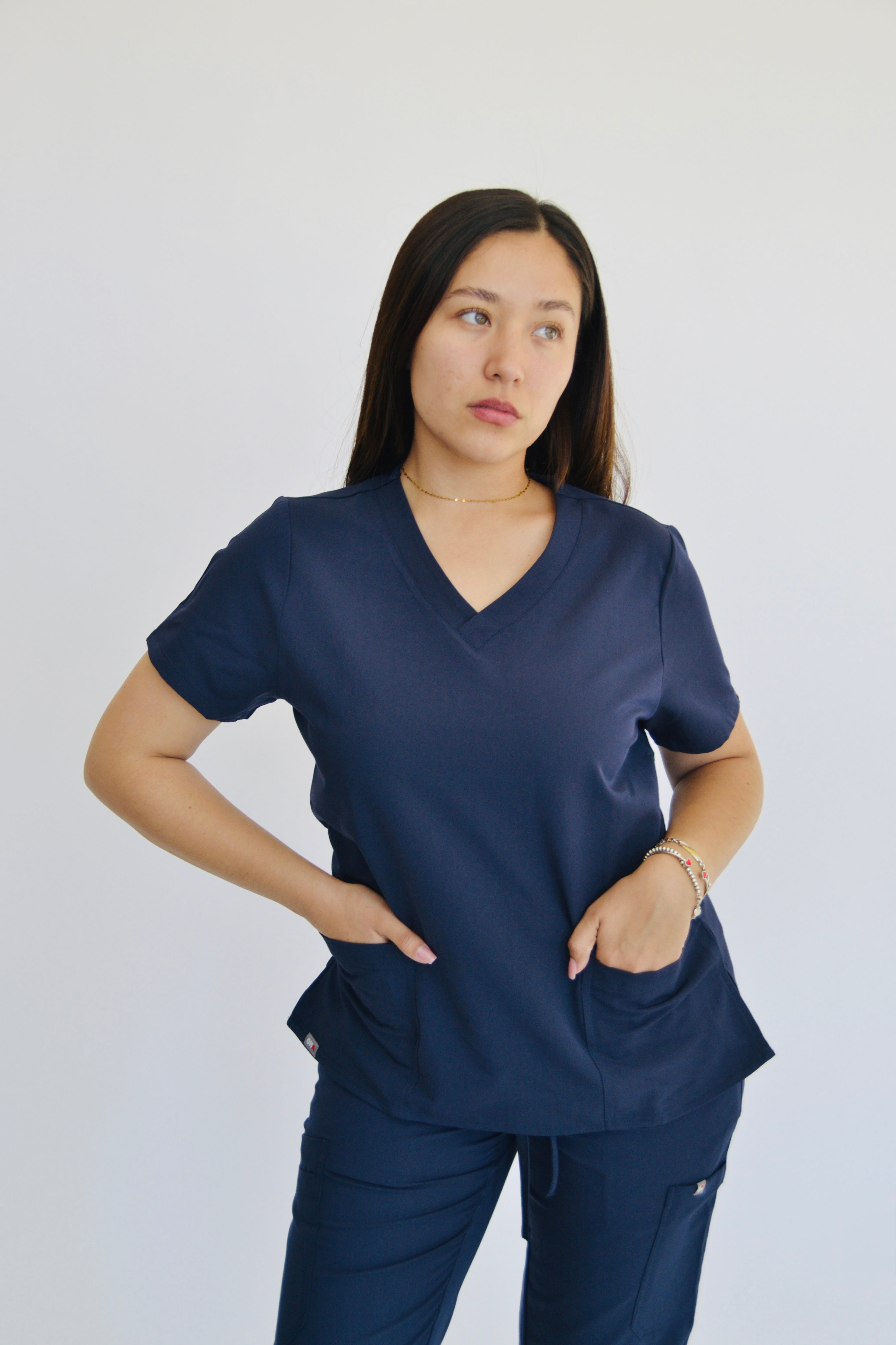 TENA V-NECK TOP WITH 2 HAND POCKETS